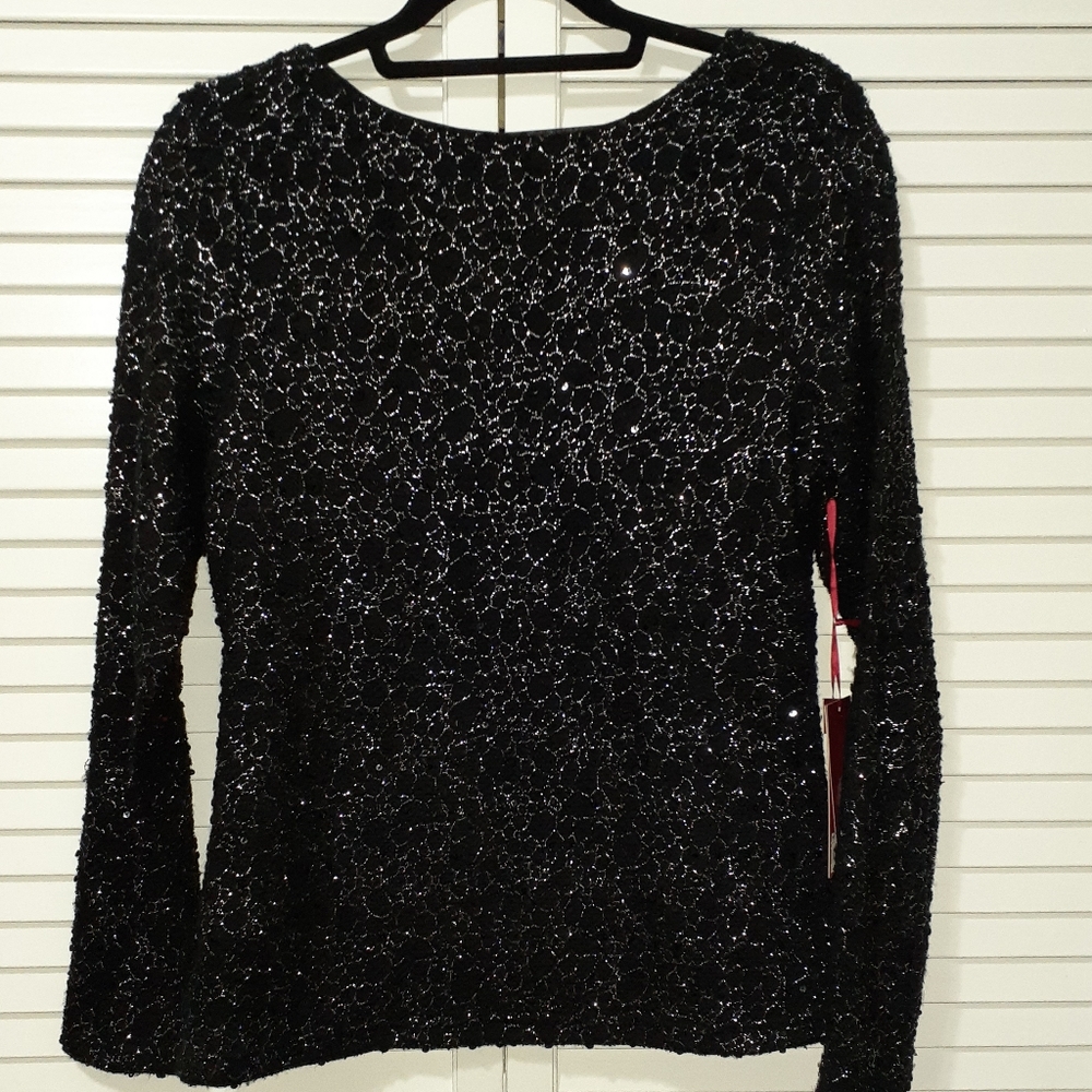 Beautiful sparkling black blouse